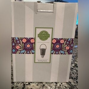 New in box Seeing Stars mini warmer